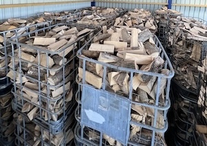 Stack of firewood in mesh bags