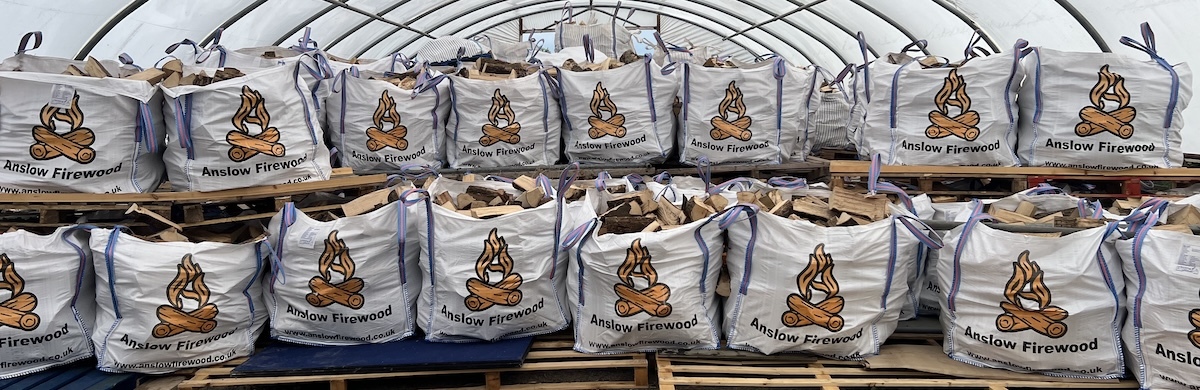 Bags of logs in polytunnel